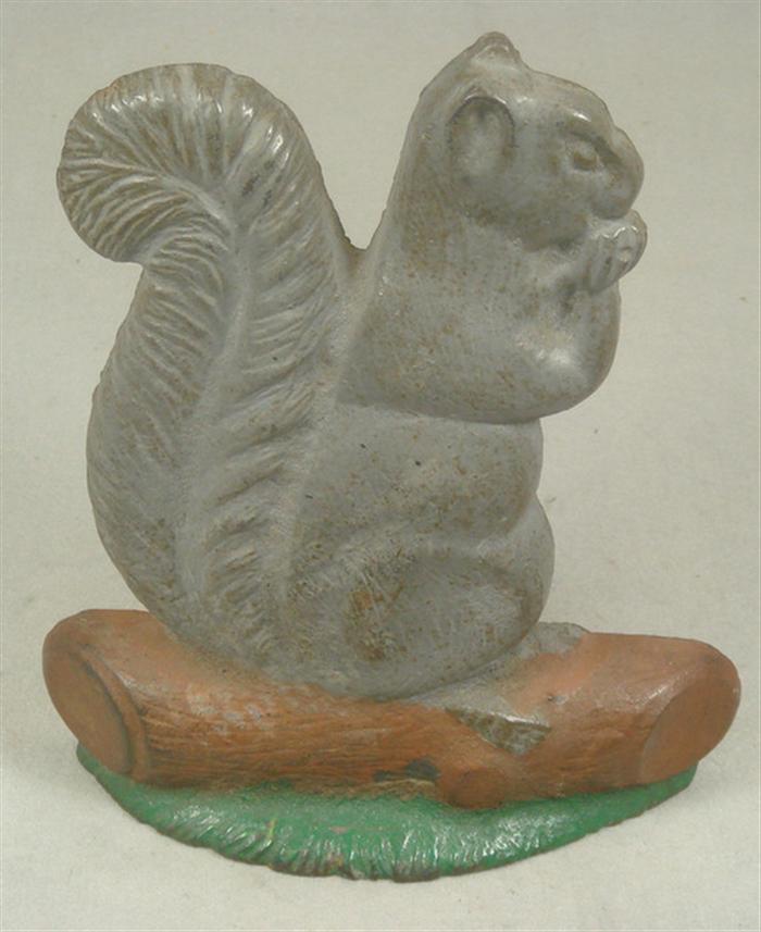 Appraisal: Cast iron doorstop large grey squirrel on wood and green