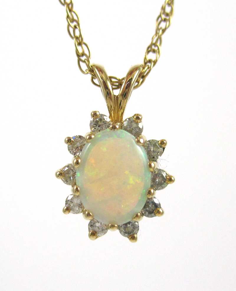 Appraisal: OPAL DIAMOND AND YELLOW GOLD PENDANT NECKLACE with a -