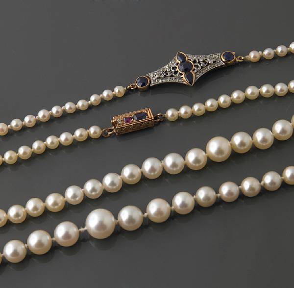 Appraisal: A collection of two single strand of cultured pearls with