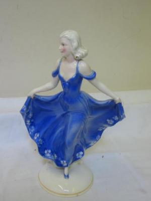 Appraisal: A KATZHUTTE POTTERY ART DECO FIGURE modelled as a lady