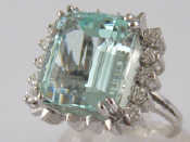 Appraisal: A white metal tests carat gold aquamarine and diamond ring