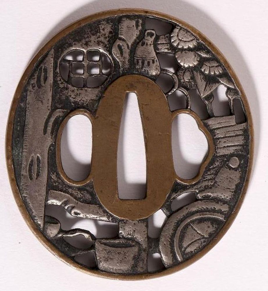 Appraisal: Japanese tsuba A mixed metal Japanese tsuba approximately inches diameter