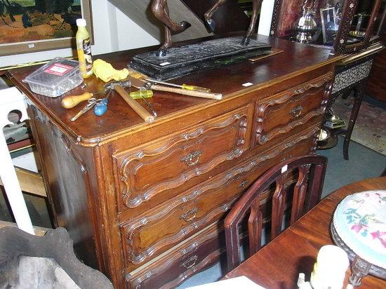 Appraisal: A TH CENTURY FRENCH CHERRYWOOD PROVINCIAL COMMODE fitted two short