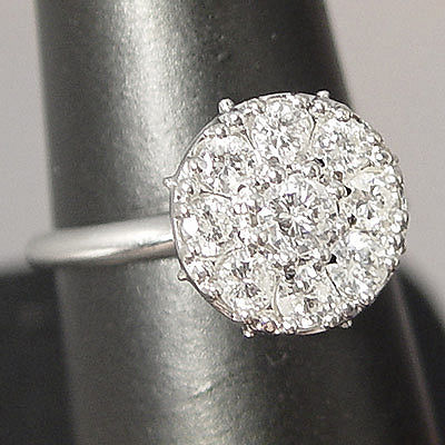 Appraisal: NINE DIAMOND CLUSTER RING K white gold ring with round