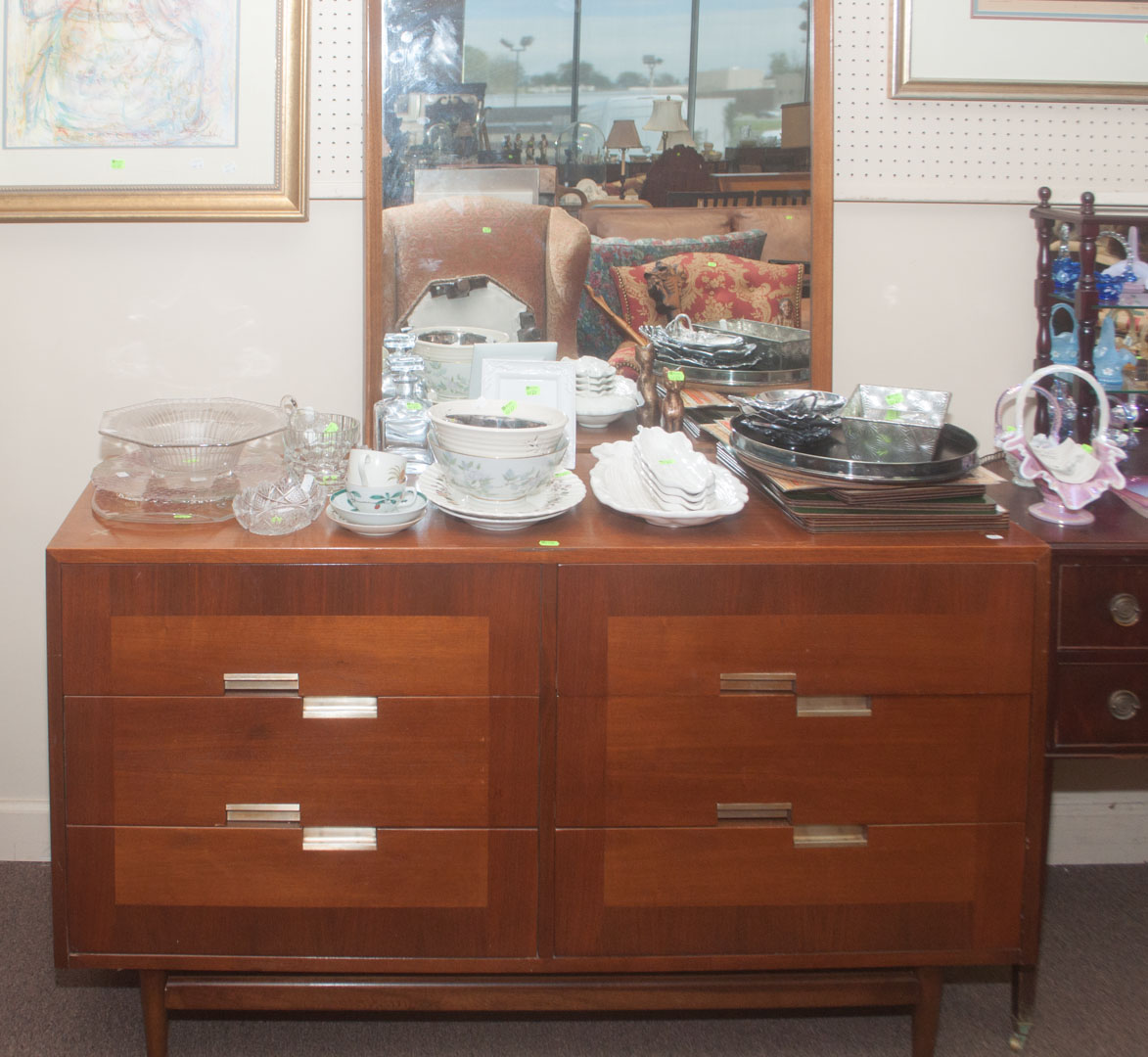 Appraisal: Two pieces of mid-century modern furniture including mirrored chest of