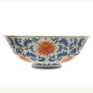 Appraisal: An Iron-Red-Decorated Underglaze Blue Bowl The exterior decorated with two