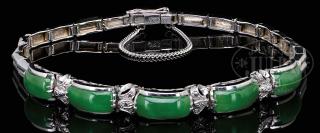 Appraisal: K GOLD AND APPLE GREEN JADEITE BRACELET K GOLD AND