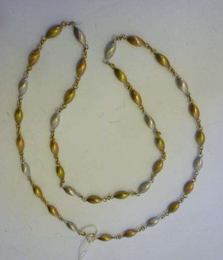 Appraisal: A THREE COLOUR CT GOLD NECKLACE with lozenge links long