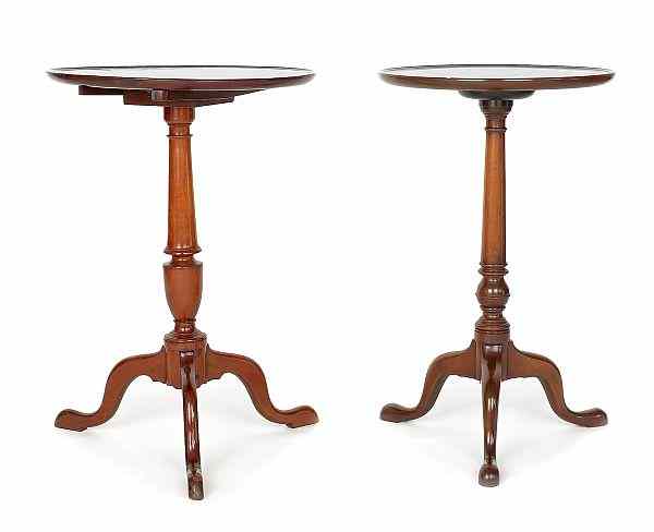 Appraisal: Two Pennsylvania cherry candlestands th c h w and h