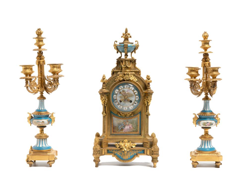 Appraisal: A gilt-bronze and porcelain mantel clock and garniture set Circa