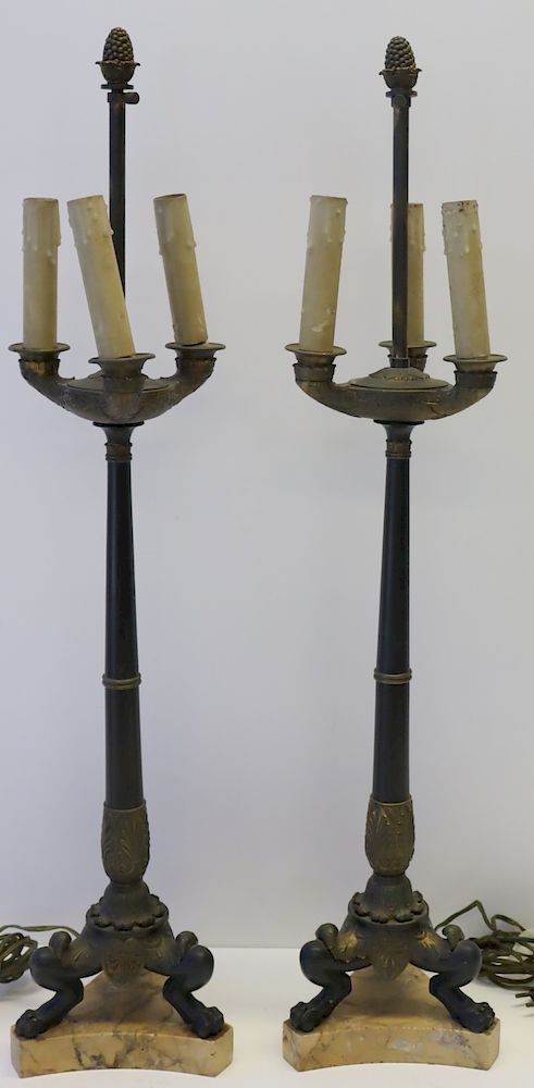 Appraisal: Pair Of Antique Bronze Claw Foot Lamps On Marble Bases