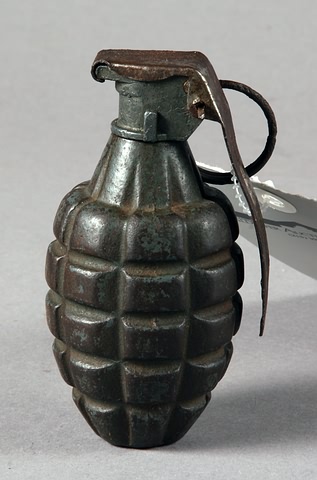 Appraisal: US Mark II defensive fragmentation grenade retains bottom screw plug