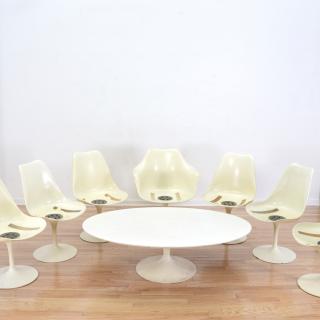 Appraisal: Eero Saarinen tulip chairs and coffee table Eero Saarinen tulip