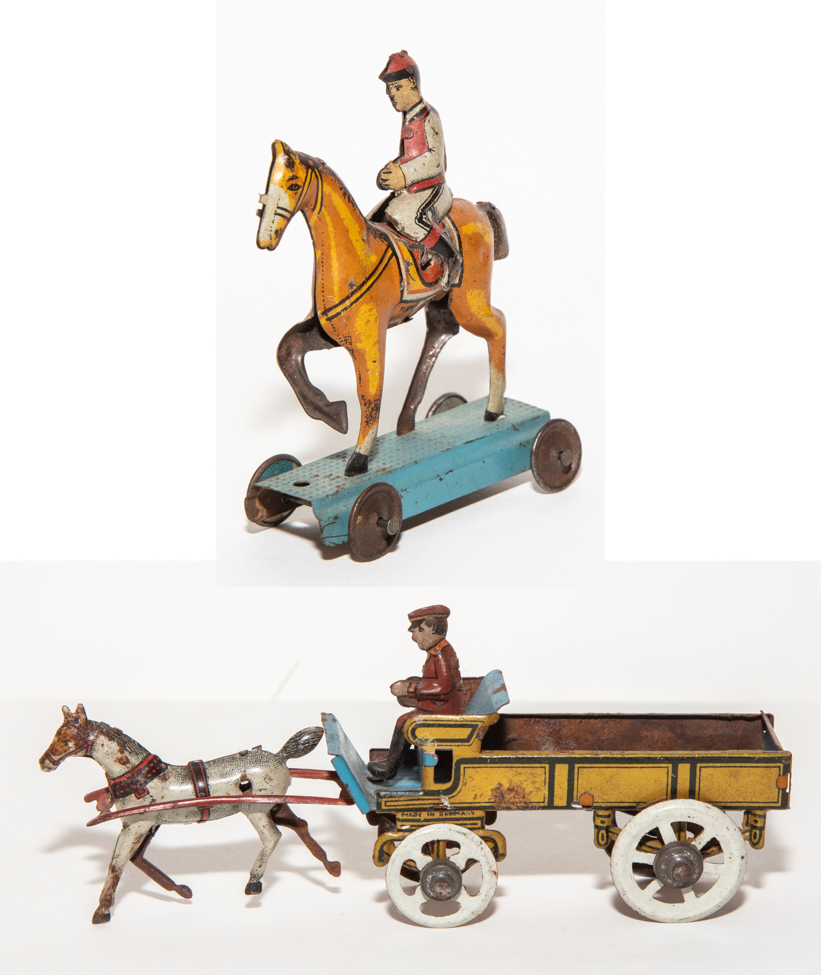 Appraisal: TWO GERMAN TIN LITHO PENNY TOYS Early th century Includes