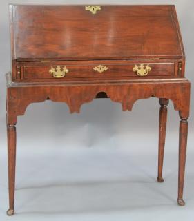 Appraisal: Cherry Queen Anne desk on frame having slant lid with