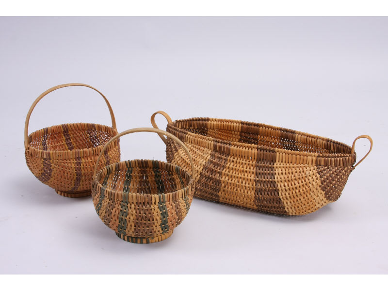 Appraisal: Three NC Cherokee Baskets two footed baskets with shaped oak