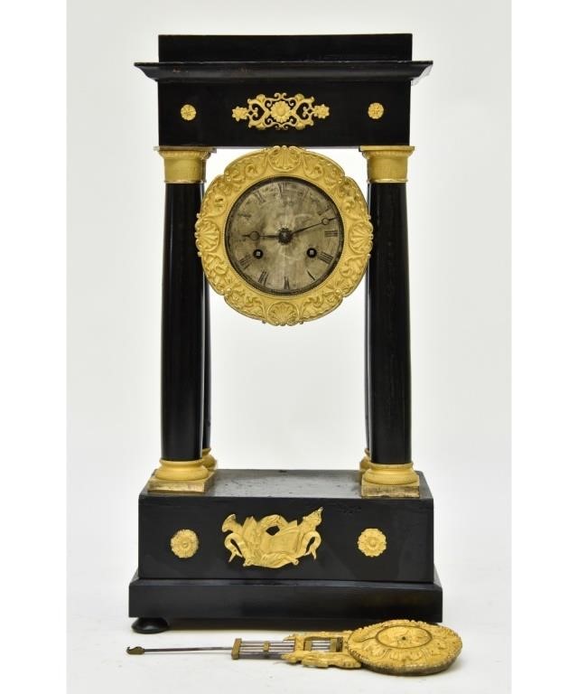 Appraisal: French portico clock black lacquered wood with fire gilt ormolu