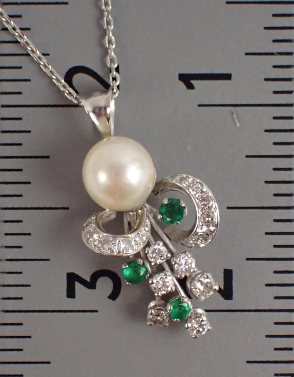 Appraisal: DIAMOND EMERALD PEARL AND WHITE GOLD PENDANT NECKLACE with an