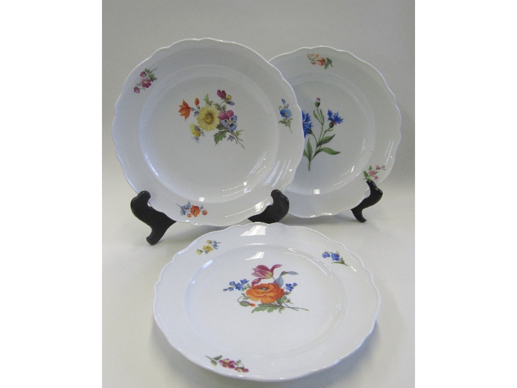 Appraisal: Three Meissen plates each decorated with flowers