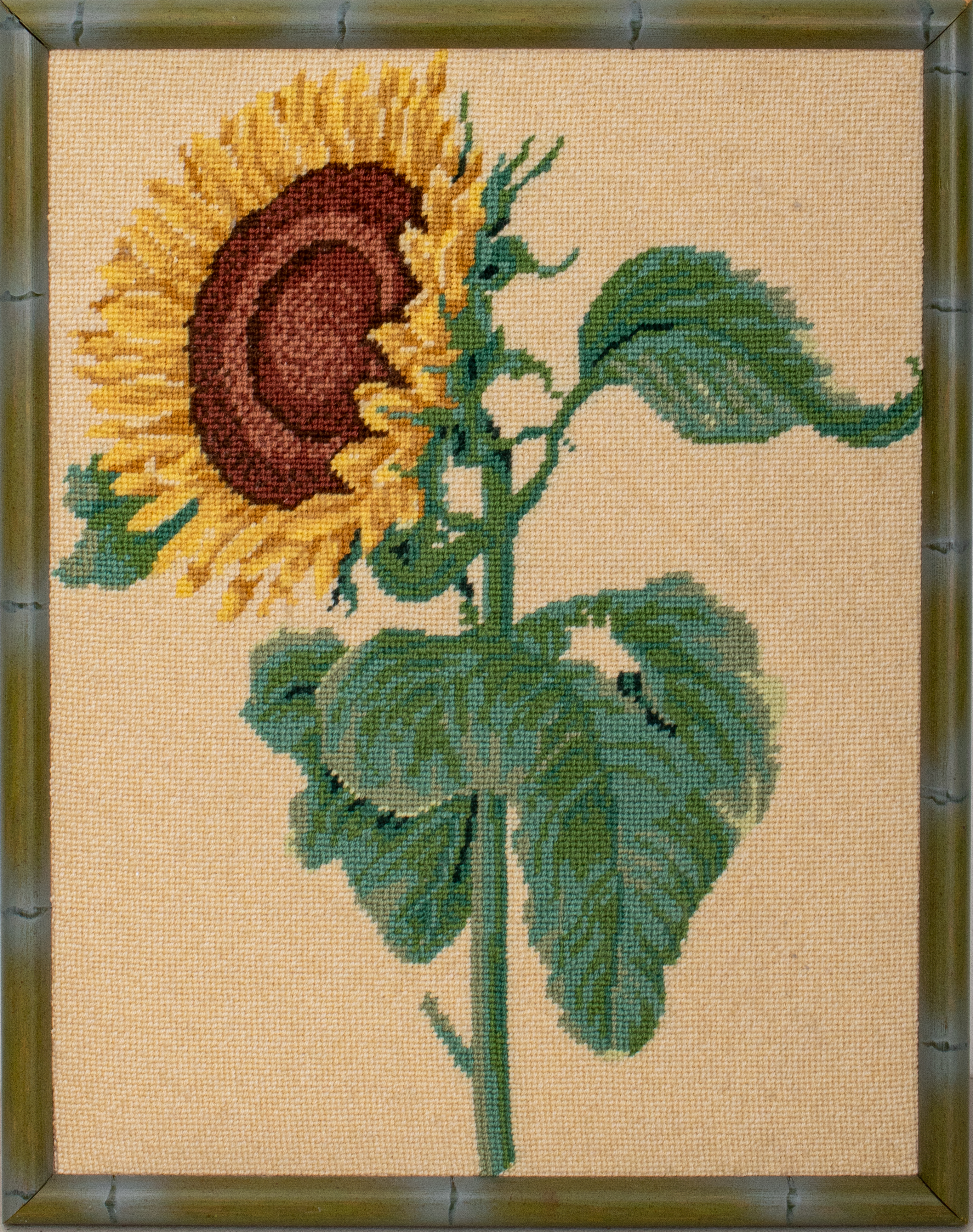 Appraisal: FRAMED CROSS STITCH OF A SUNFLOWER Framed cross stitch embroidery