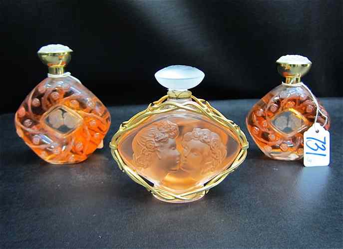 Appraisal: SET OF THREE LALIQUE ''LE BAISER'' FLACON COLLECTION PERFUMES with