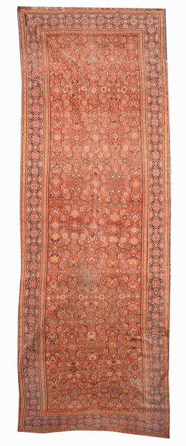 Appraisal: A LATE TH CENTURY KARABAGH RUST GROUND HALL CARPET with