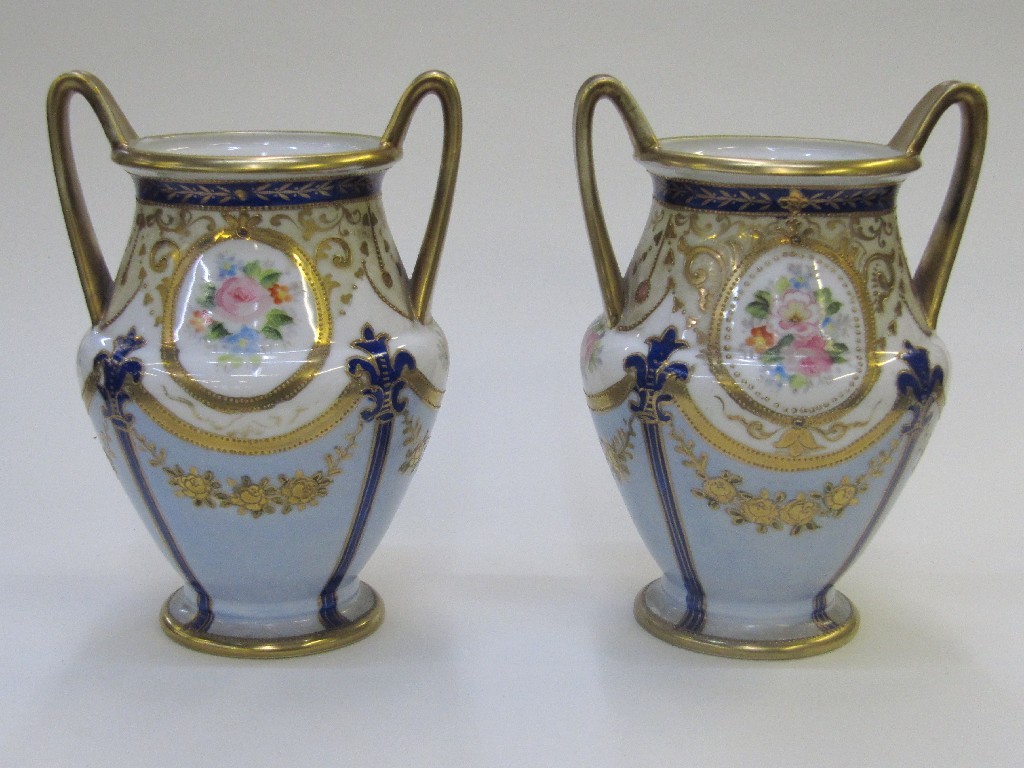 Appraisal: Pair of two handled Noritake vases decorated with swags and