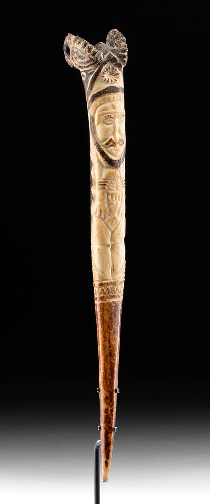 Appraisal: th C PNG Cassowary Bird Bone Spoon Figural Originally Listed