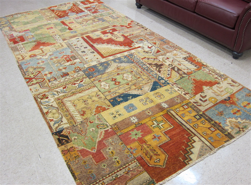 Appraisal: HAND KNOTTED ORIENTAL CARPET Pakistani-Persian mosaic panel design without border