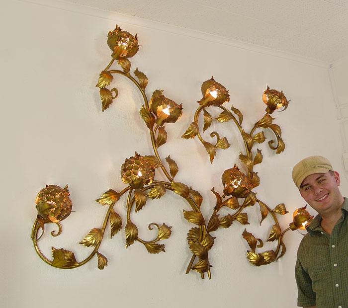 Appraisal: LIGHT GILT METAL WALL SCULPTURE Circa 's Approx ' long