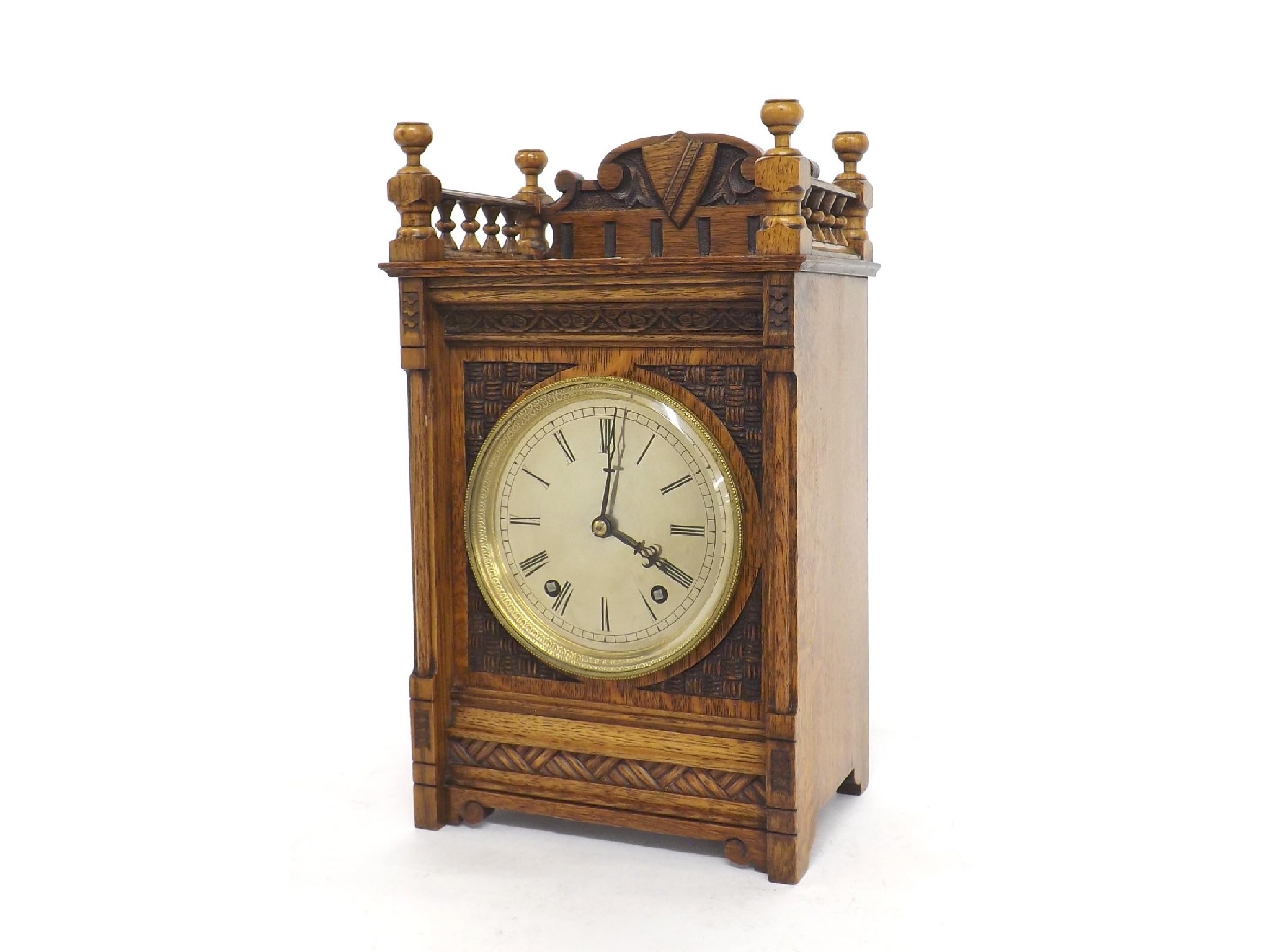 Appraisal: German oak two train mantel clock striking on a gong