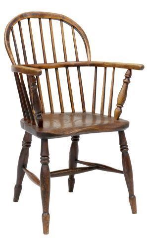 Appraisal: English elm Windsor armchair th c sack-back hoop-back frame seven