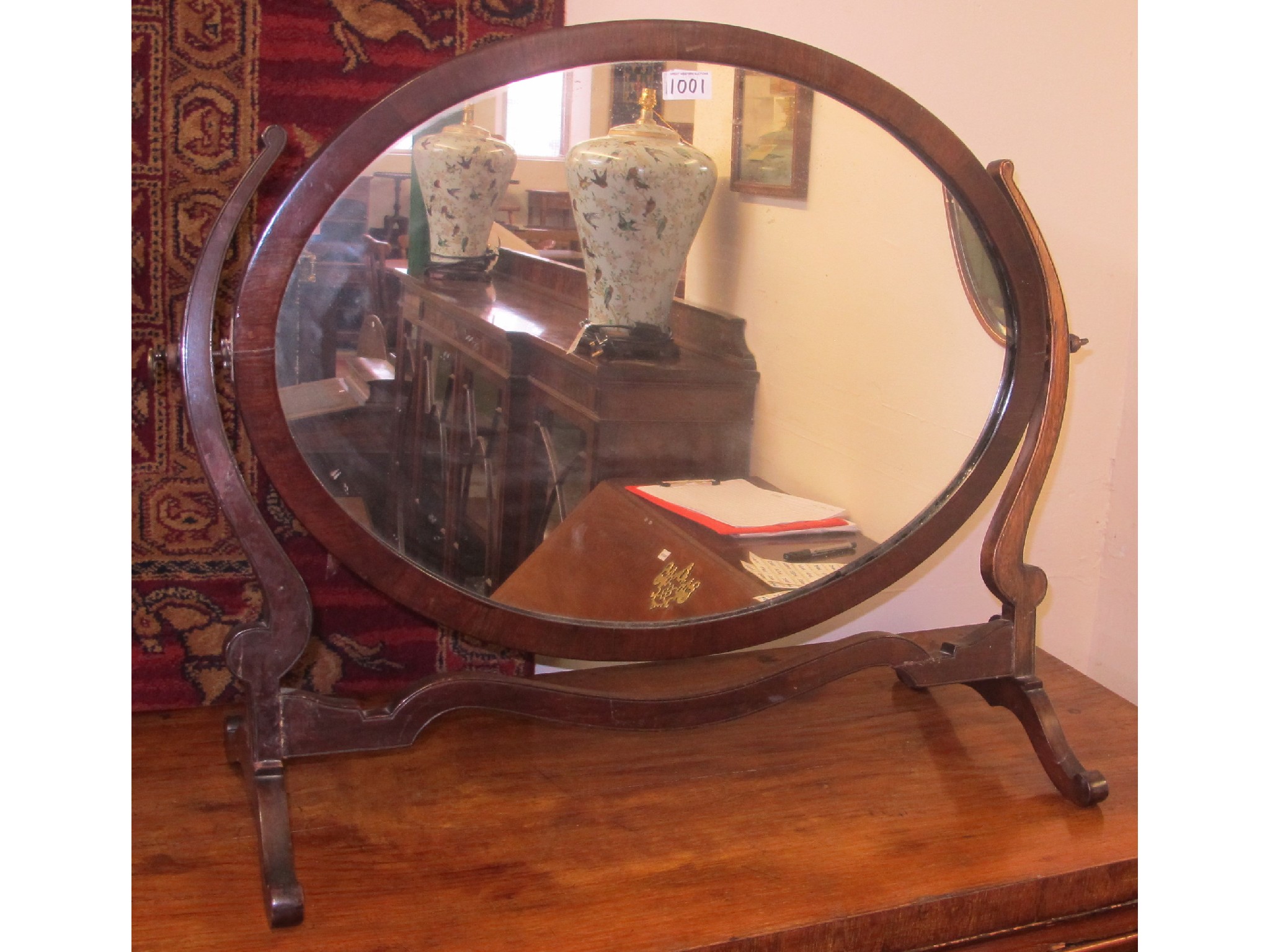 Appraisal: A mahogany framed dressing mirror