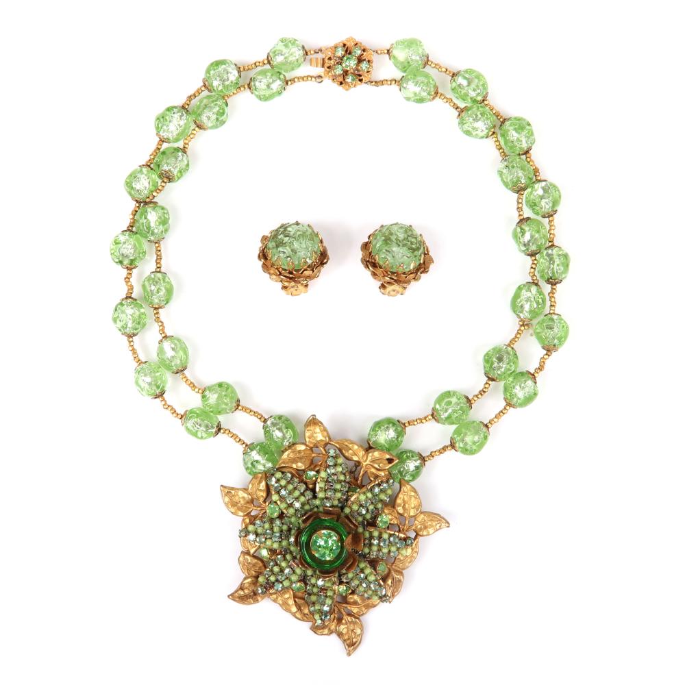 Appraisal: MIRIAM HASKELL DOUBLE STRAND NECKLACE WITH GREEN POURED GLASS BEADS