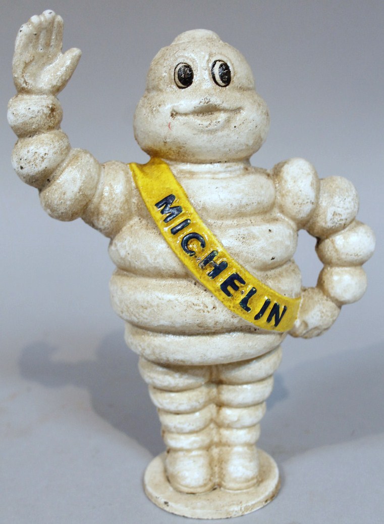 Appraisal: A modern metal Michelin money bank cm high