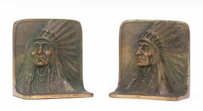 Appraisal: A Pair of Cast Bronze Bookends Bracket shape bookends cast