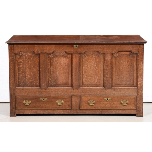 Appraisal: A George III oak mule chest the front having four