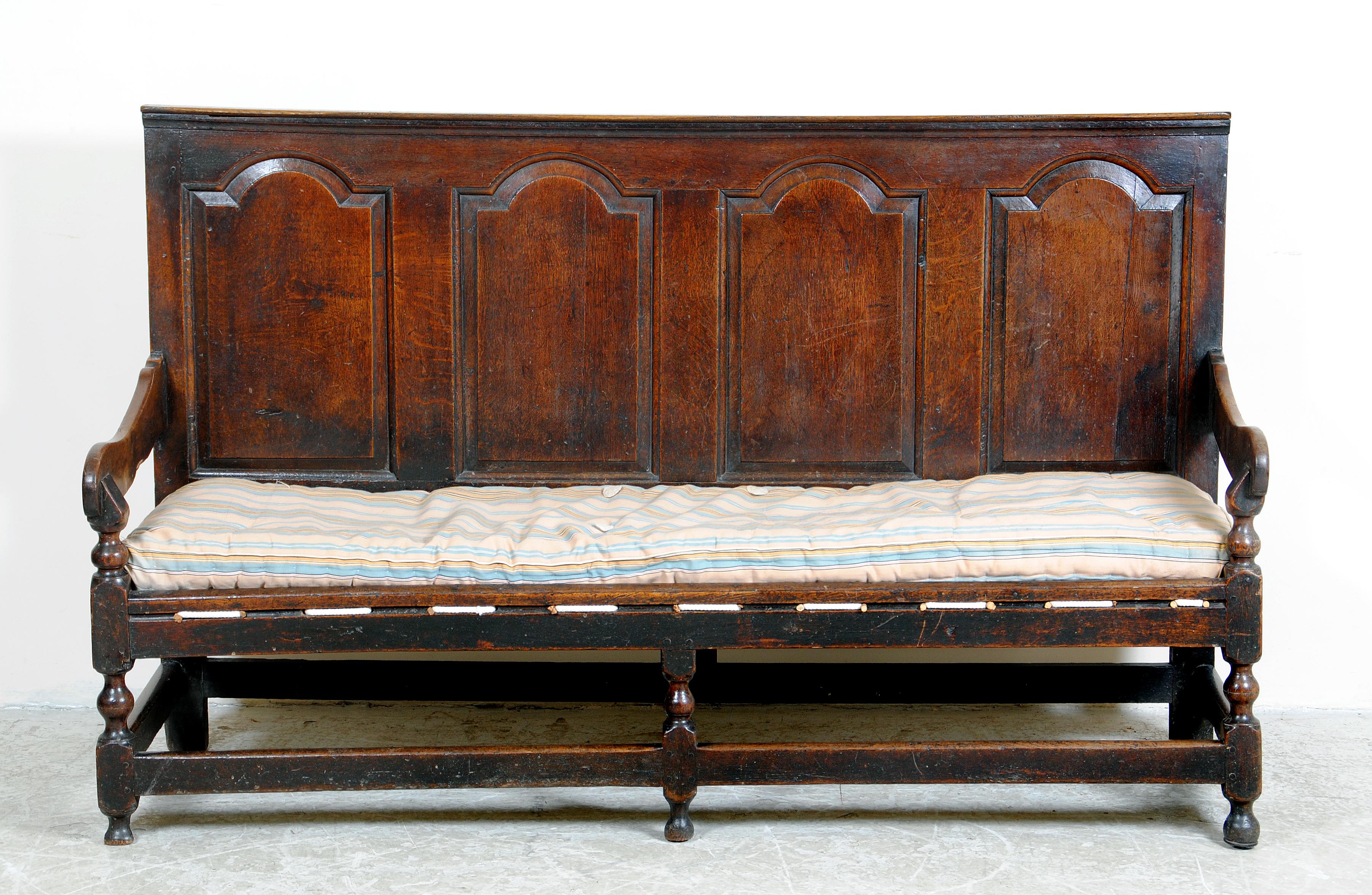 Appraisal: AN OAK SETTLE th century the oblong back with four