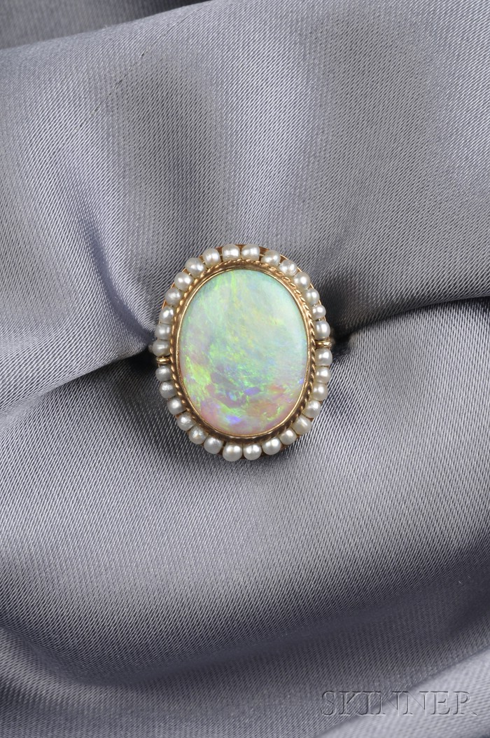 Appraisal: kt Gold Opal and Seed Pearl Ring bezel-set with an