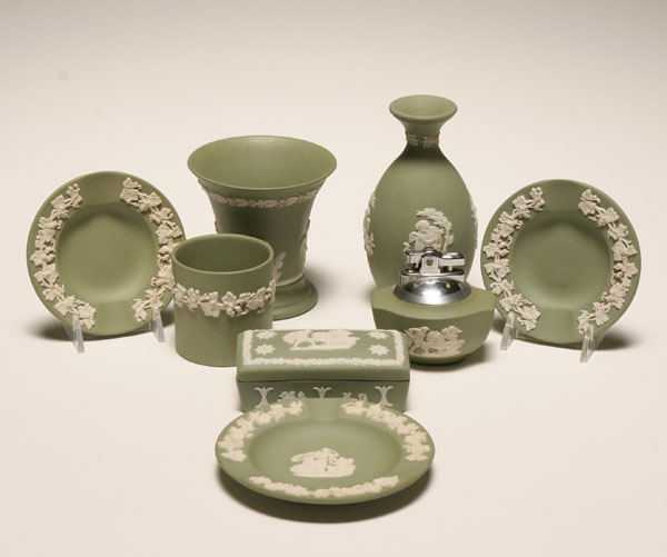 Appraisal: Wedgwood classically themed green jasperware table articles including vases dishes