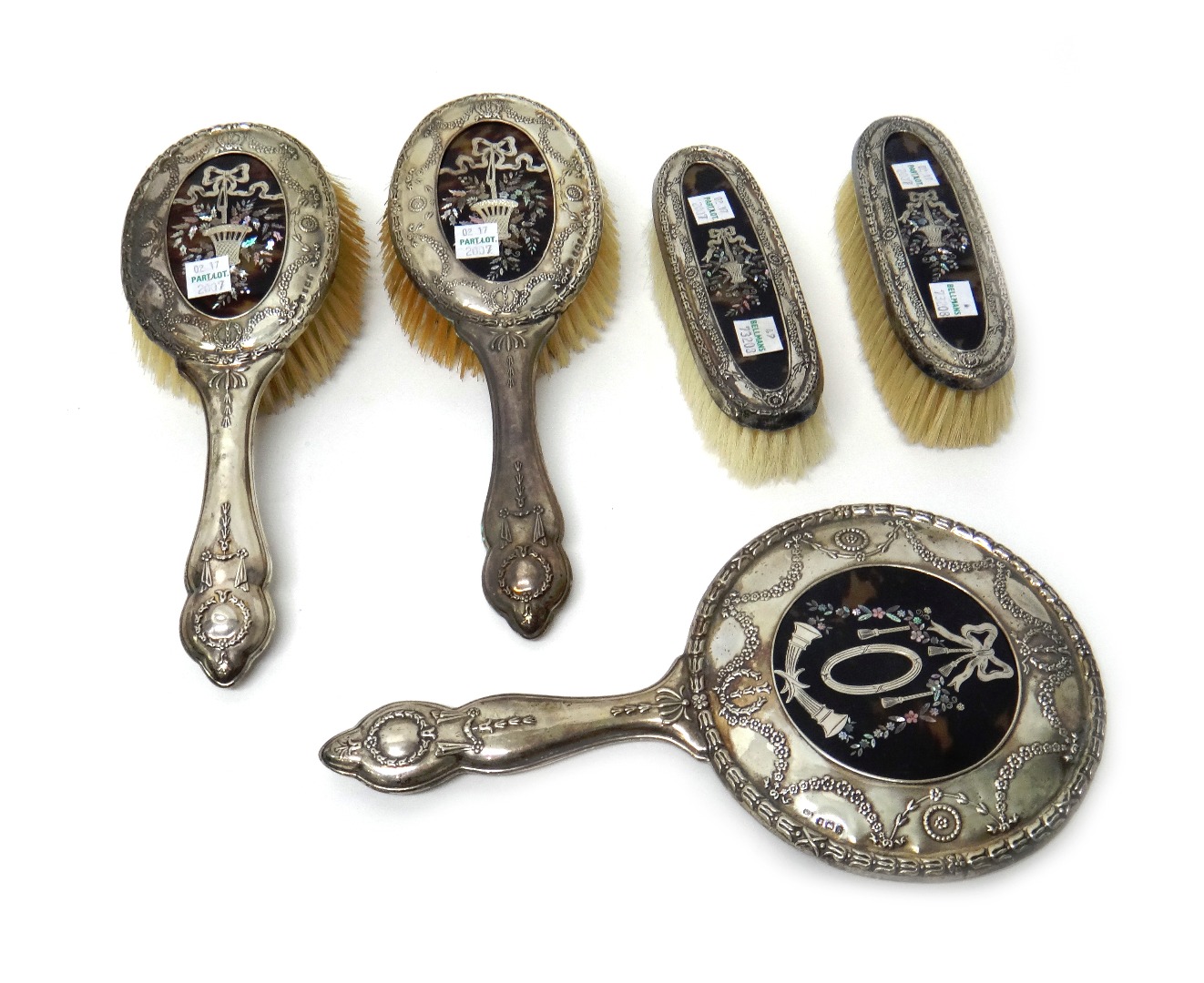 Appraisal: A lady's silver tortoiseshell and abalone shell mounted five piece