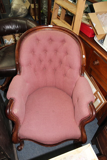 Appraisal: A TH CENTURY MAHOGANY FRAMED BUTTON BACK UPHOLSTERED ARMCHAIR standing