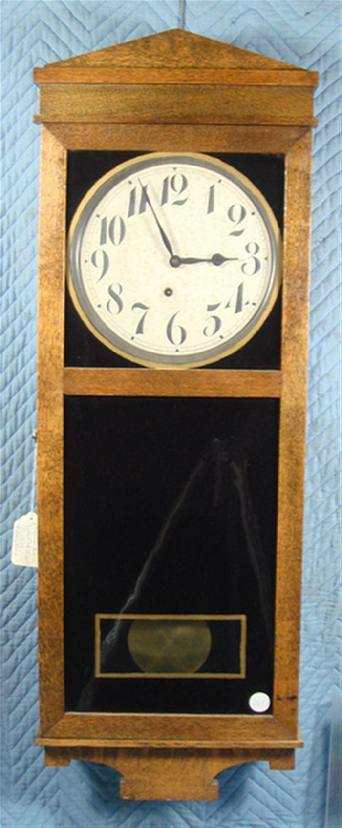 Appraisal: Ingrraham oak time only wall regulator reverse painted lower glass