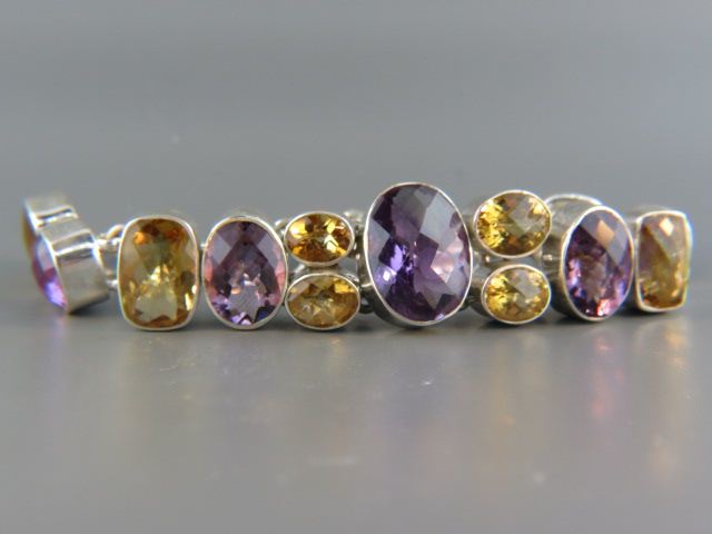 Appraisal: Amethyst Citrine Bracelet beautifully faceted gems totaling over carats in