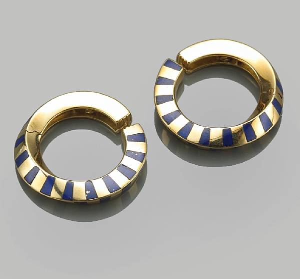 Appraisal: A pair of enamel and eighteen karat gold hinged earclips