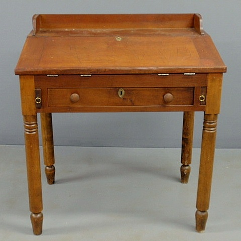 Appraisal: Sheraton cherry schoolmaster s desk c with a slant lid