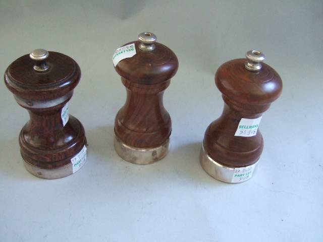 Appraisal: A silver mounted wooden capstan shaped pepper mill Birmingham and