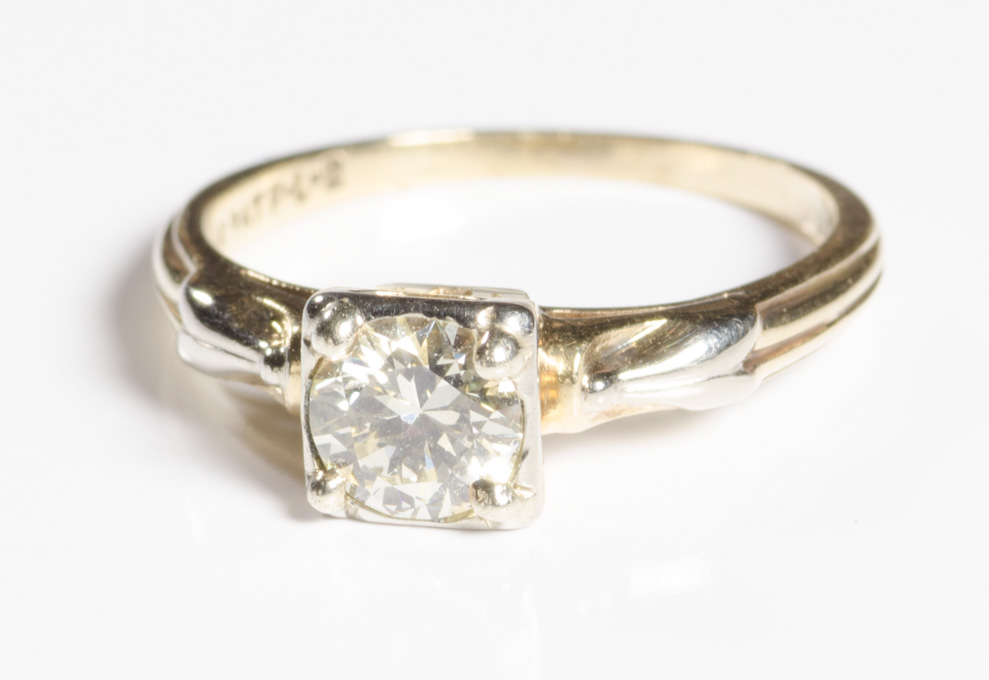 Appraisal: ESTATE DIAMOND AND FOURTEEN KARAT WHITE GOLD RING set with