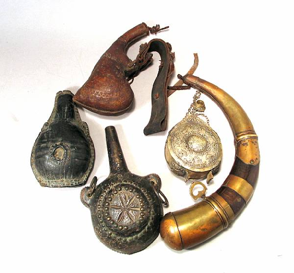 Appraisal: A lot of five Middle Eastern powder flasks th early