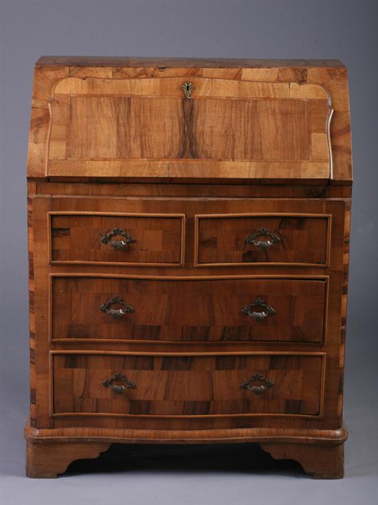 Appraisal: CONTINENTAL INLAID WALNUT SLANT-FRONT DESK th century Shaped fall-front lid